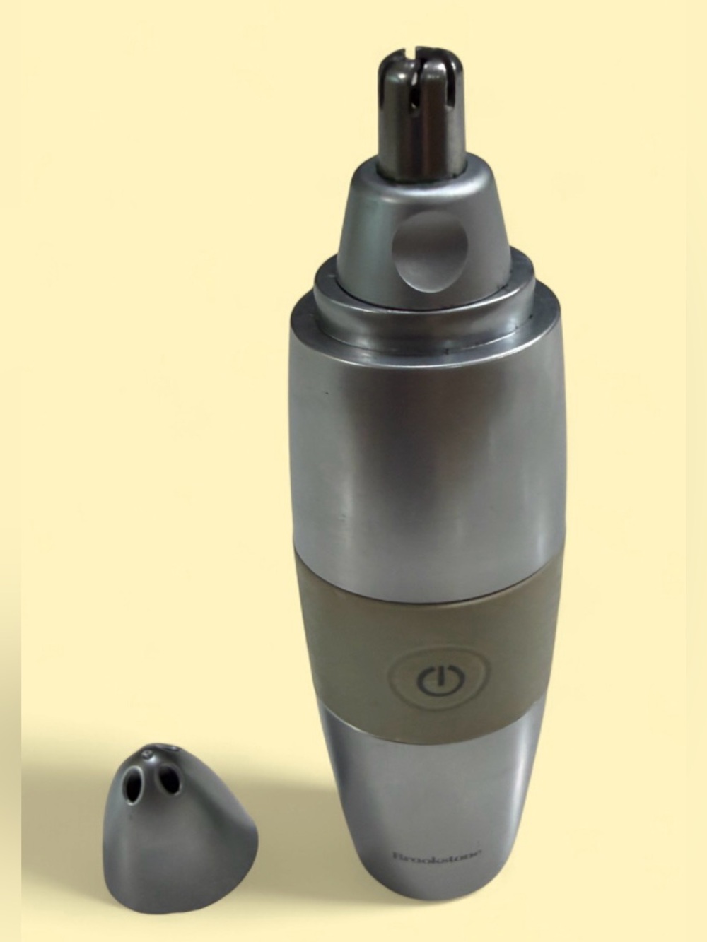 Brookstone Silver Facial & Nose Trimmer with Beige Grip AA Battery Operated.